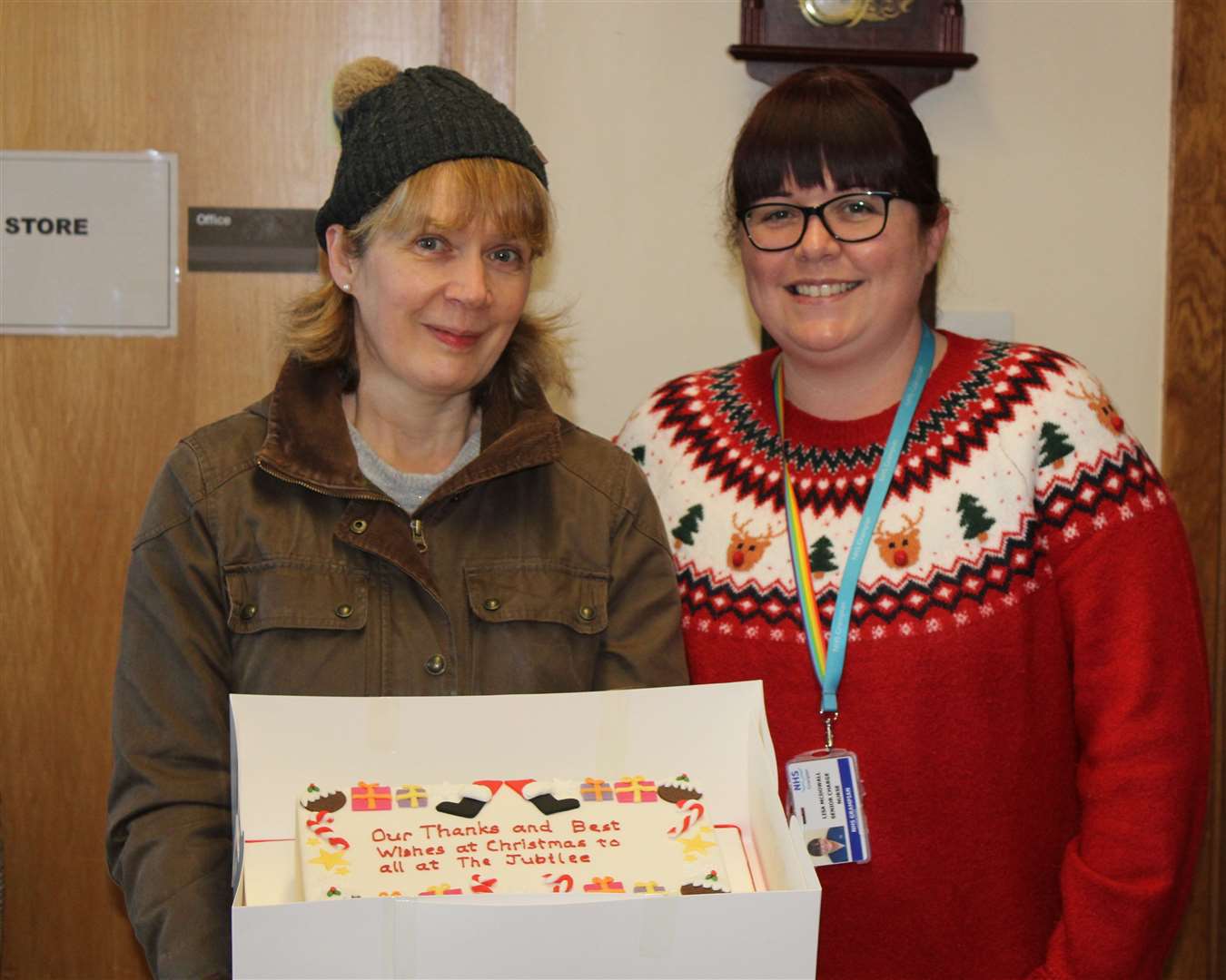 Cake baker Evelyn Muir (left) with Lisa McDowall, in charge of the Rothieden and Minor Injuries Unit.