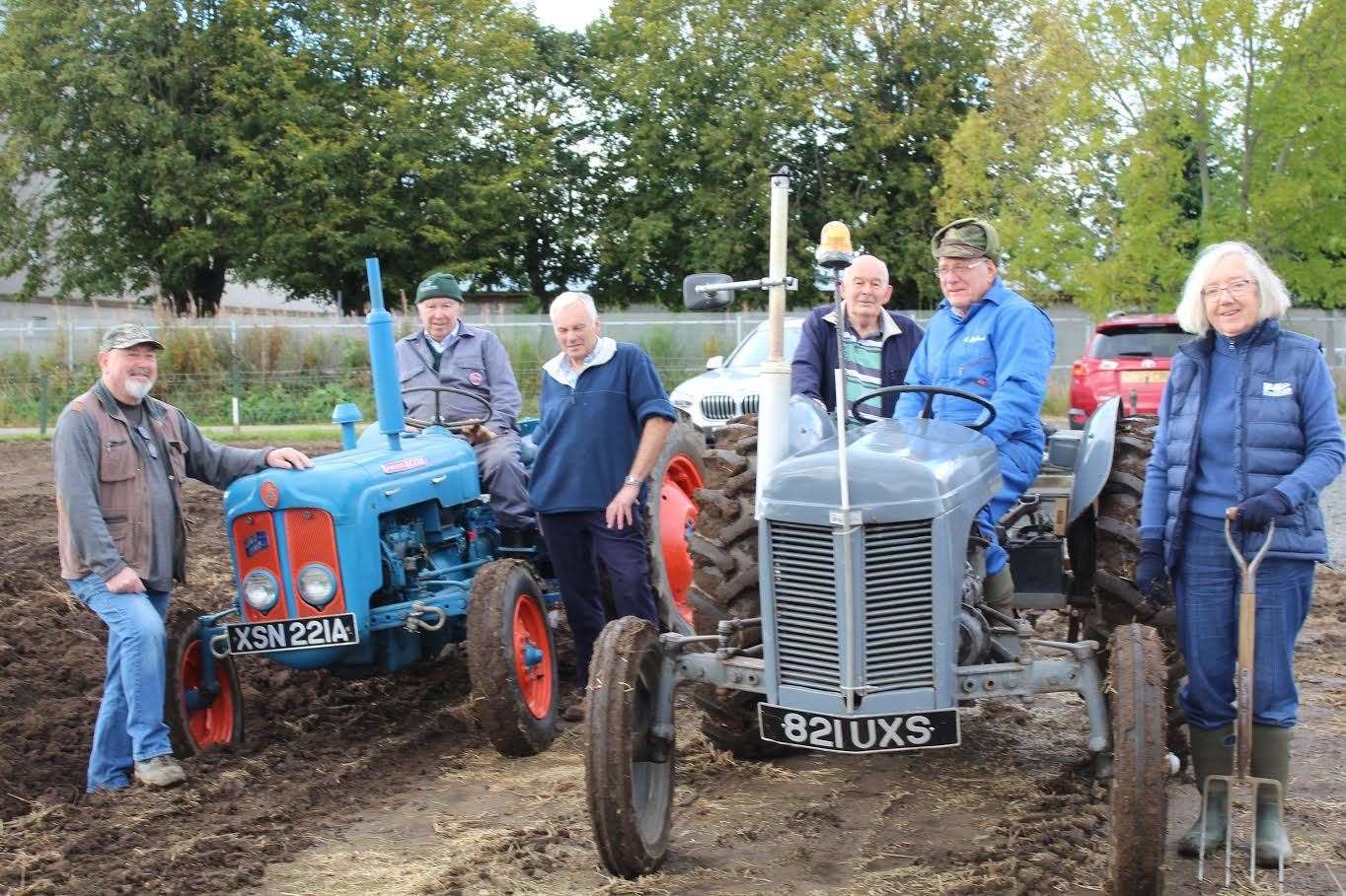 Members of Inverurie and District Mens Shed - Graeme Shepherd, Doug Scott, Henry Wilson, Alex Smith, Bob Shepherd and supporter Gwen Wilson - enjoyed the first ploughing session at the new plot. Picture: Griselda McGregor