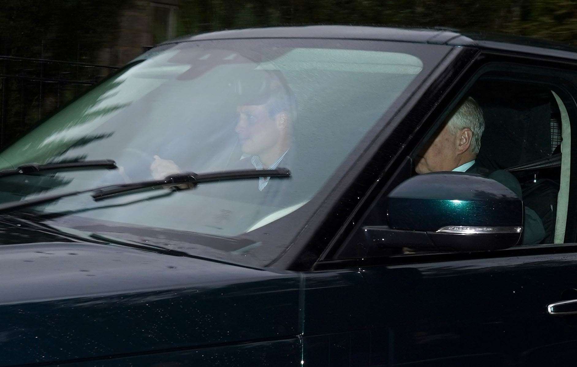 The Duke of Cambridge drives a car carrying the Duke of York, and the Earl and Countess of Wessex into Balmoral (Andrew Milligan/PA)
