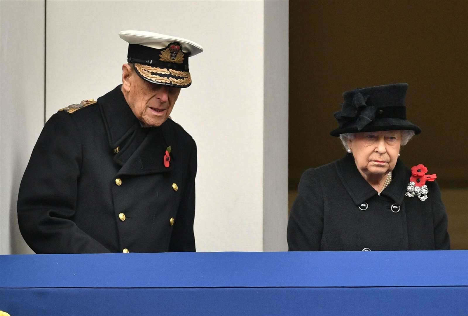The Queen and the Duke of Edinburgh observe the annual Remembrance Sunday Service at the Cenotaph memorial from a balcony in Whitehall (Dominic Lipinski/PA)