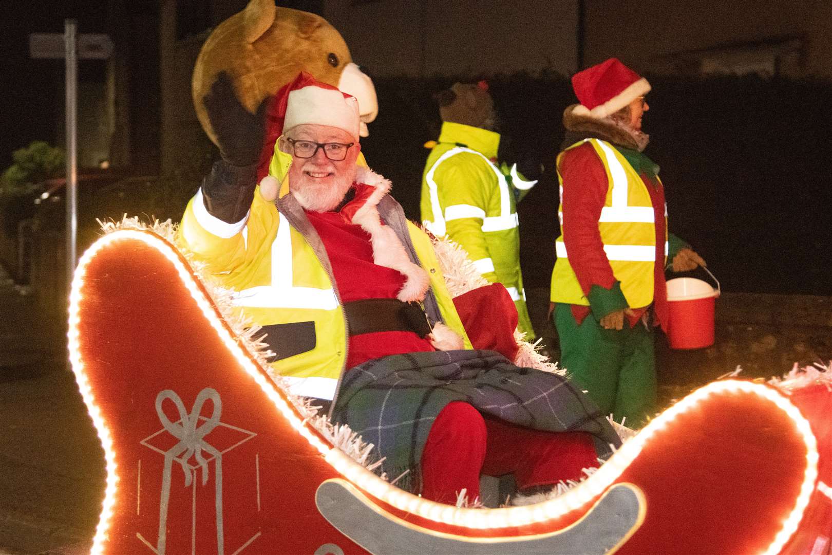 Santa is driven around the streets of Keith by Calum Stuart and his tractor as they raise money for the town's Christmas Lights...Picture: Daniel Forsyth..