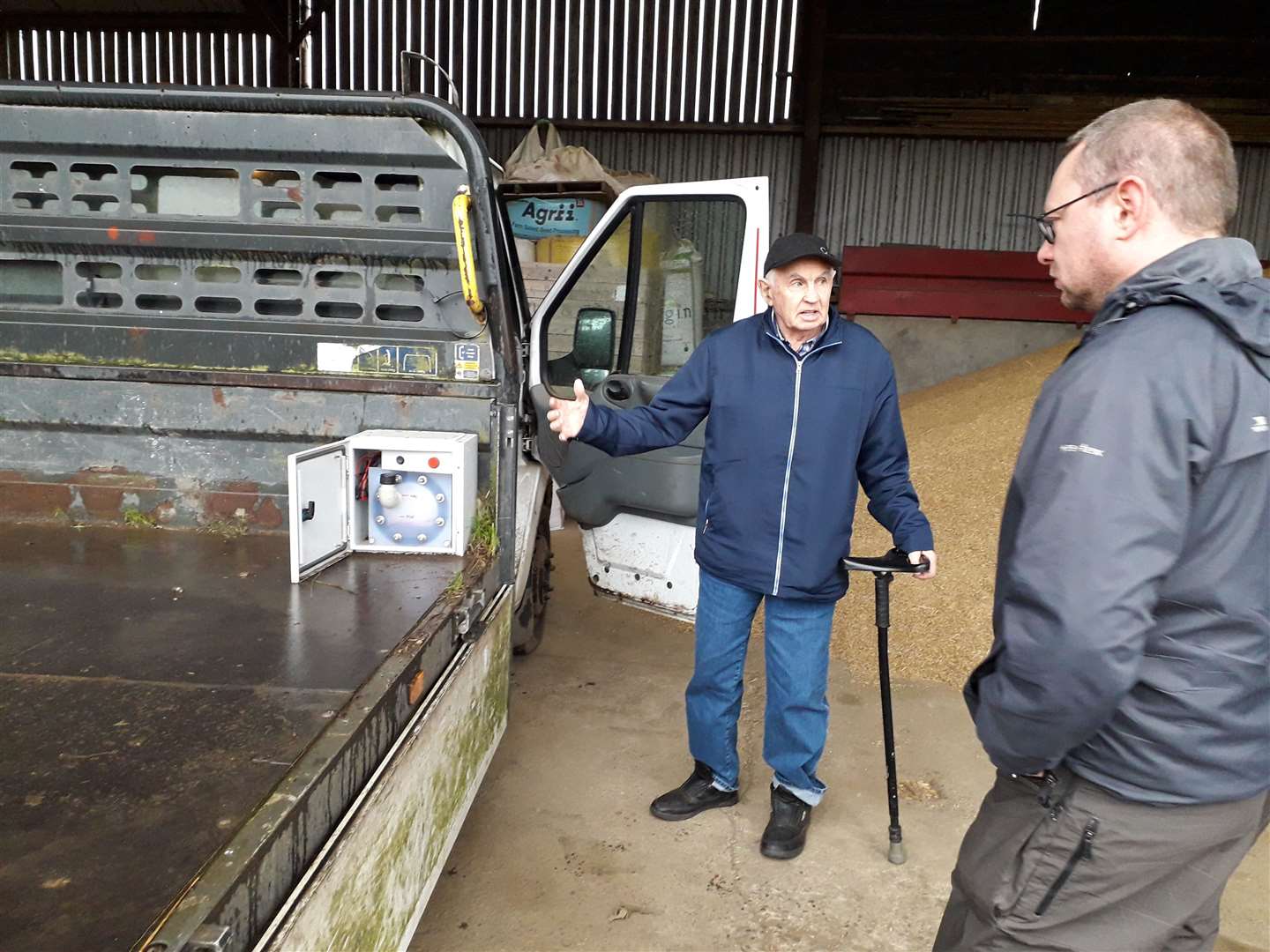 North-east farmer David Smith (l) demonstrating his hydrogen-powered truck to Gordon MP Richard Thomson
