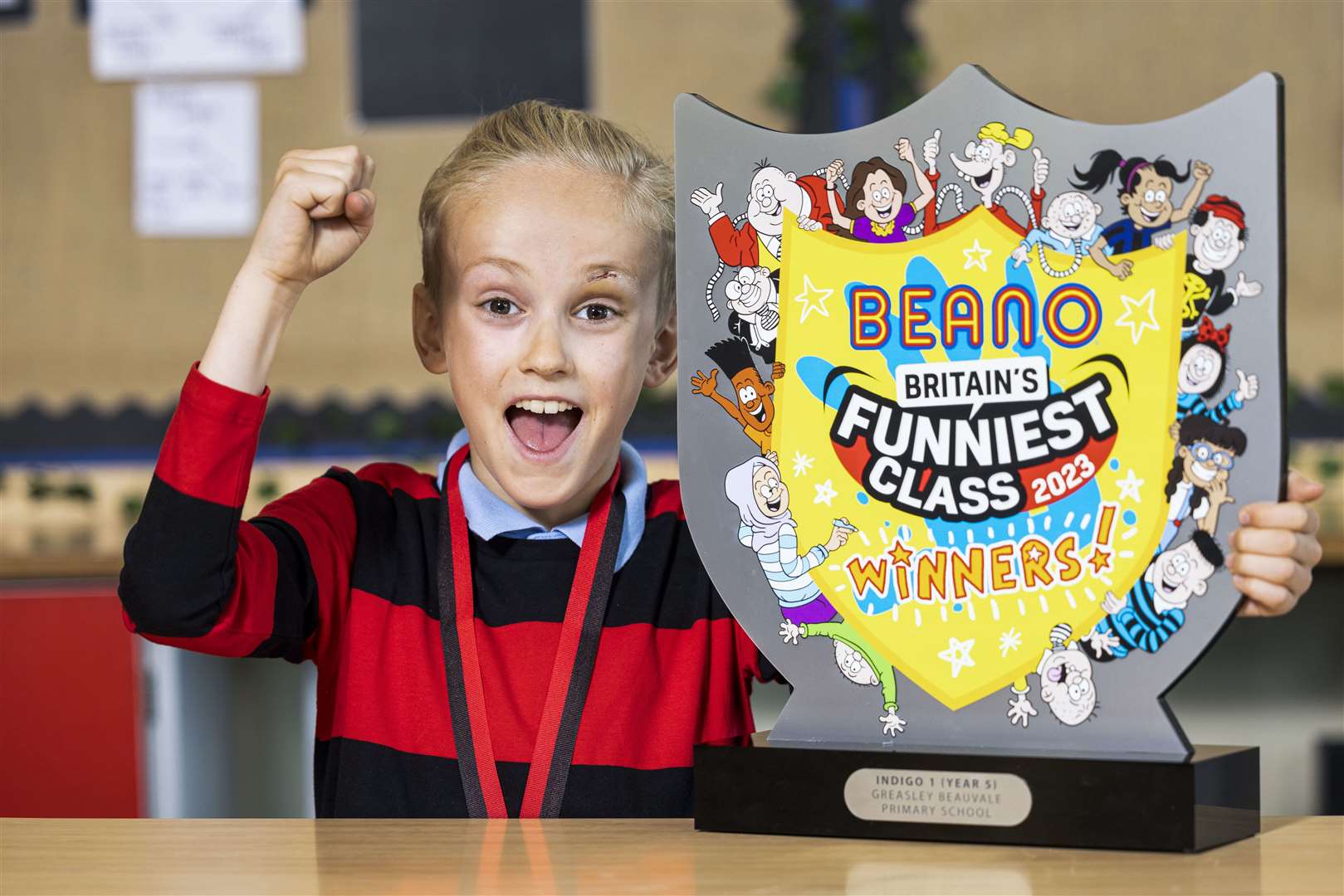 Oliver Proudler, 10, with the Britain’s Funniest Class 2023 trophy from Greasley Beauvale Primary School in Eastwood after being named the nation’s funniest class by Beano (PA Wire)