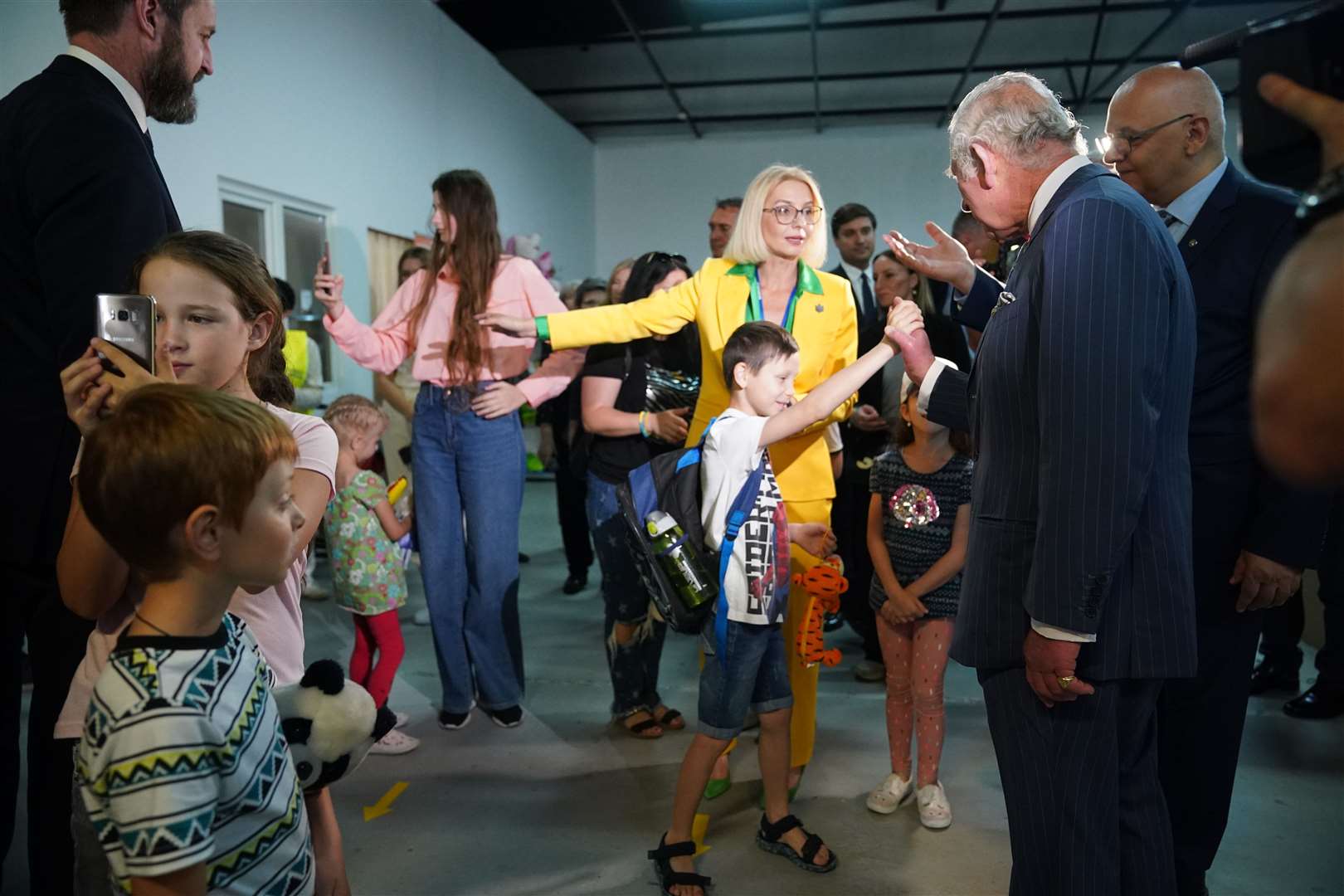 Charles during his visit to the Ukrainian refugee centre in Bucharest (Yui Mok/PA)