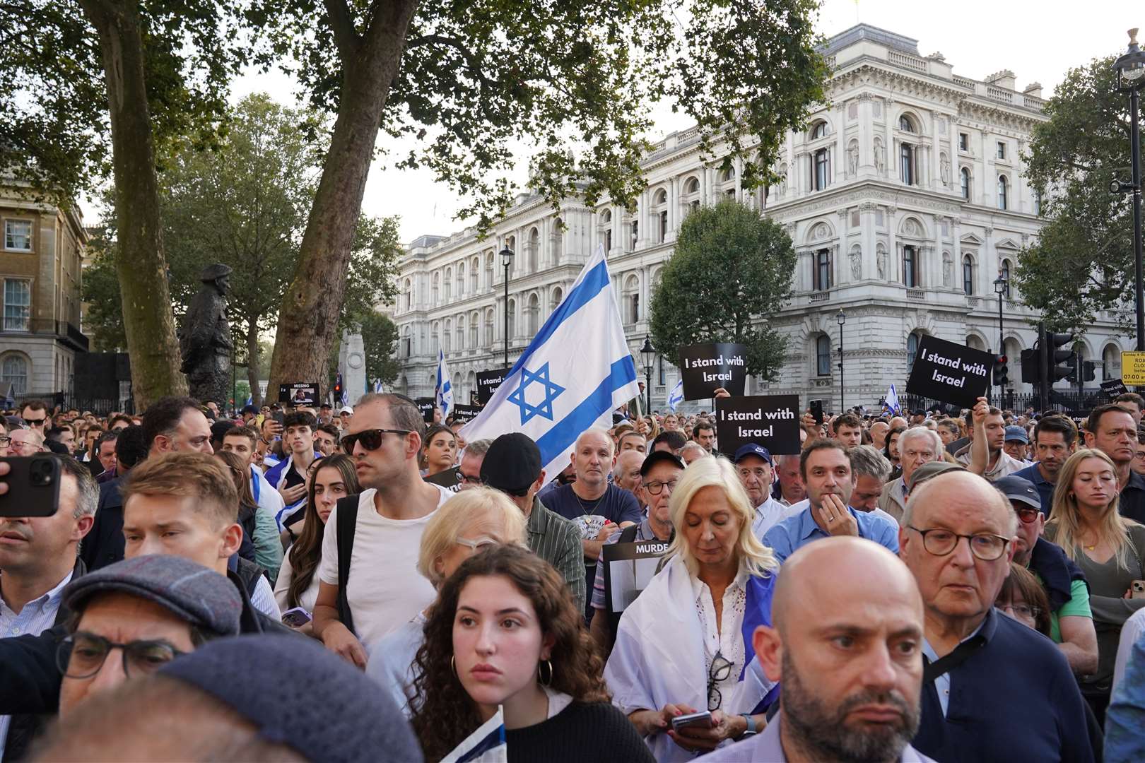 People attending a vigil outside Downing Street for victims and hostages of the Hamas attacks (Lucy North/PA)