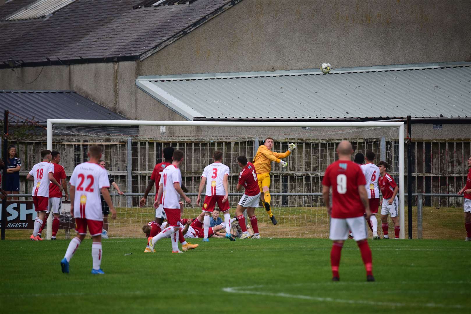 Action from Princess Royal Park as Vale keeper Sean McIntosh clears the danger. Photo: Michael Cox