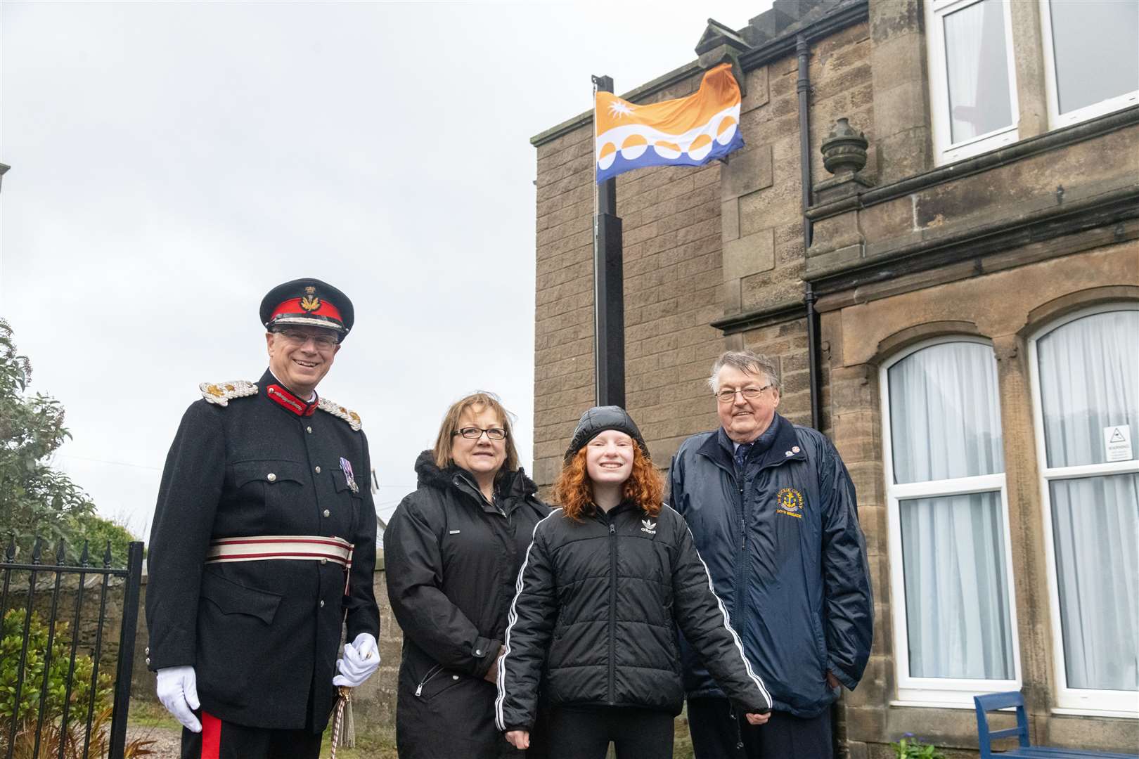 From left: Lord-Lieutenant of Banffshire Andrew Simpson; Councillor Sonya Warren; Ellie Stewart, who designed the flag, and deputy Lord-Lieutenant Alan McIntosh. Picture: Beth Taylor.
