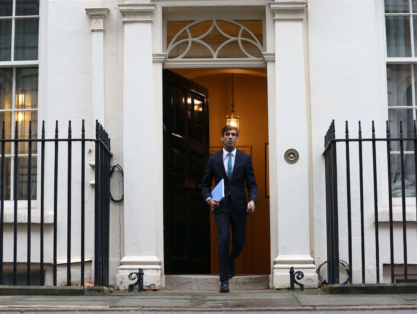Chancellor Rishi Sunak leaves 11 Downing Street ahead of delivering his Spending Review in the House of Commons (Yui Mok/PA)