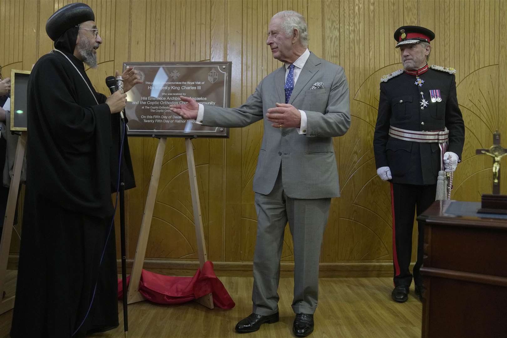 The King and Archbishop Angaelos unveiled a plaque following the Advent service and Christmas reception at the Coptic Orthodox Church Centre UK (Kin Cheung/PA)