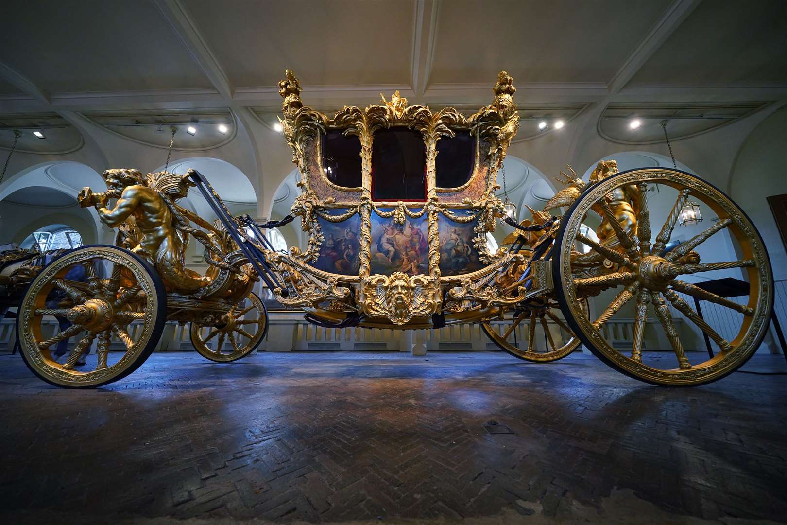 The Gold State Coach in its home in the Royal Mews (Yui Mok/PA)