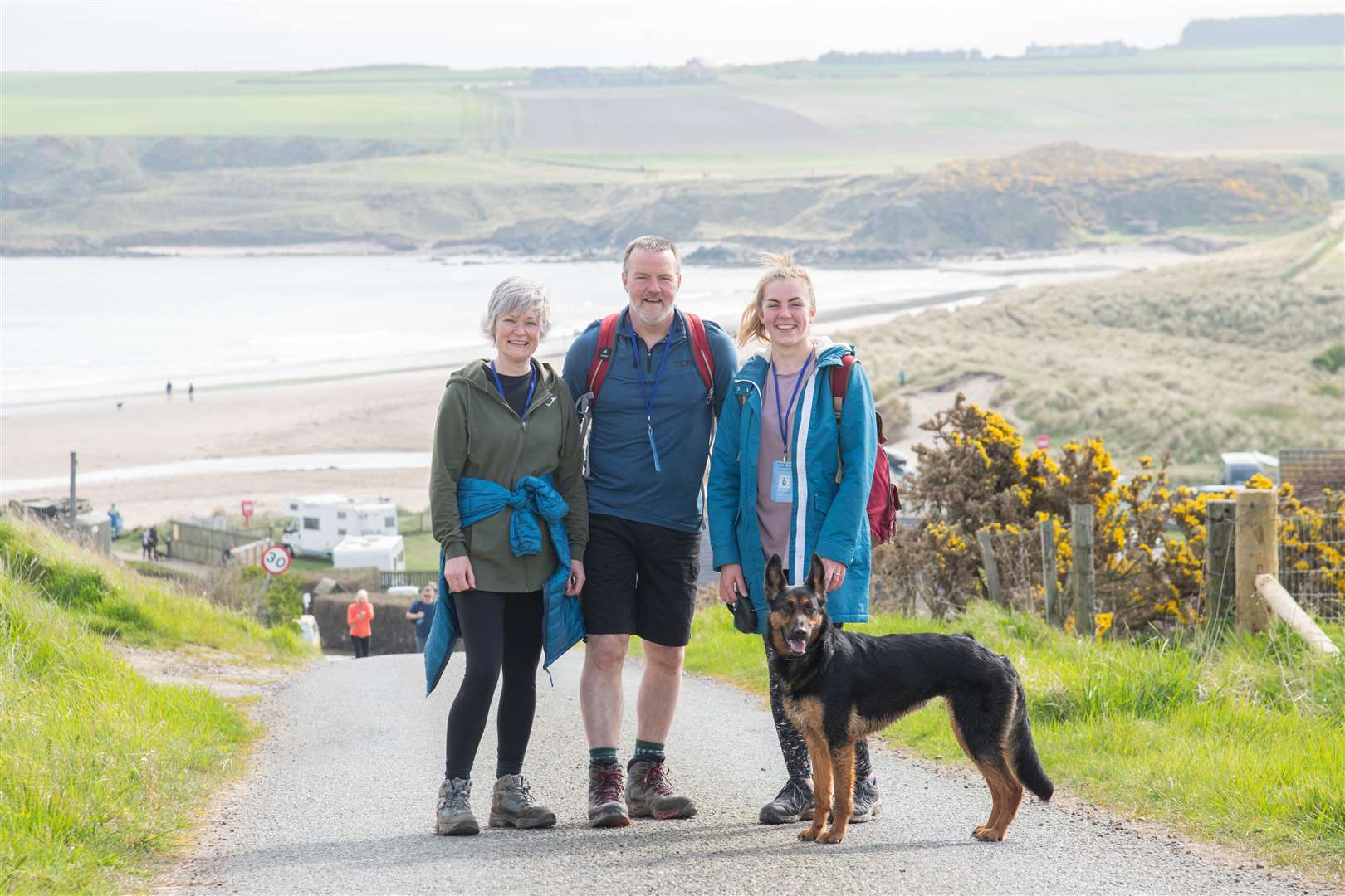 Shona, Ian and Stacey Innes with Annie their dog leave Sandend. Picture: Daniel Forsyth