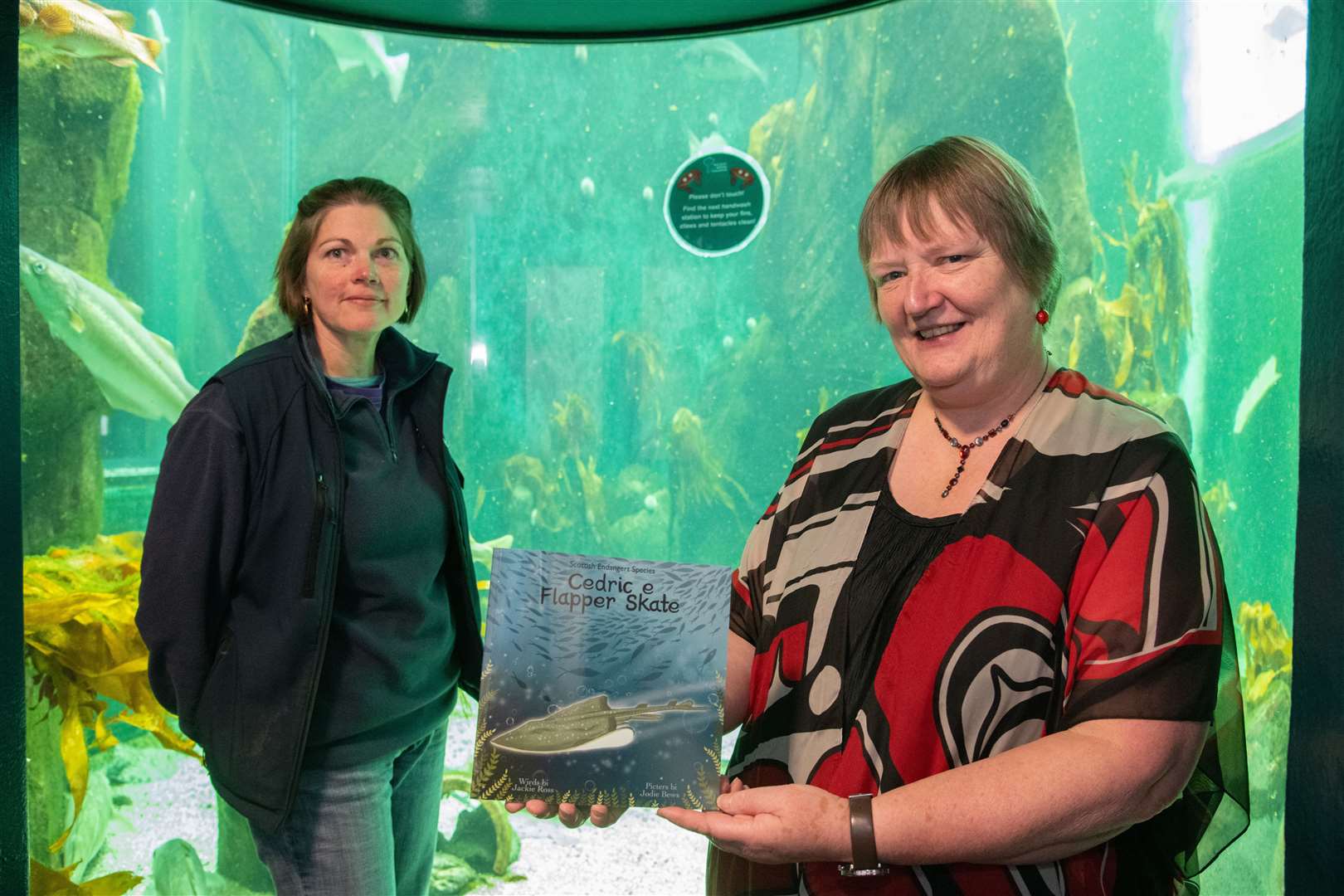 Macduff Marine Aquarium learning officer Marie Dare (left) and Jackie Ross (right) author of Cedric e Flapper Skate book which was launched at the visitor attraction. Picture: Daniel Forsyth