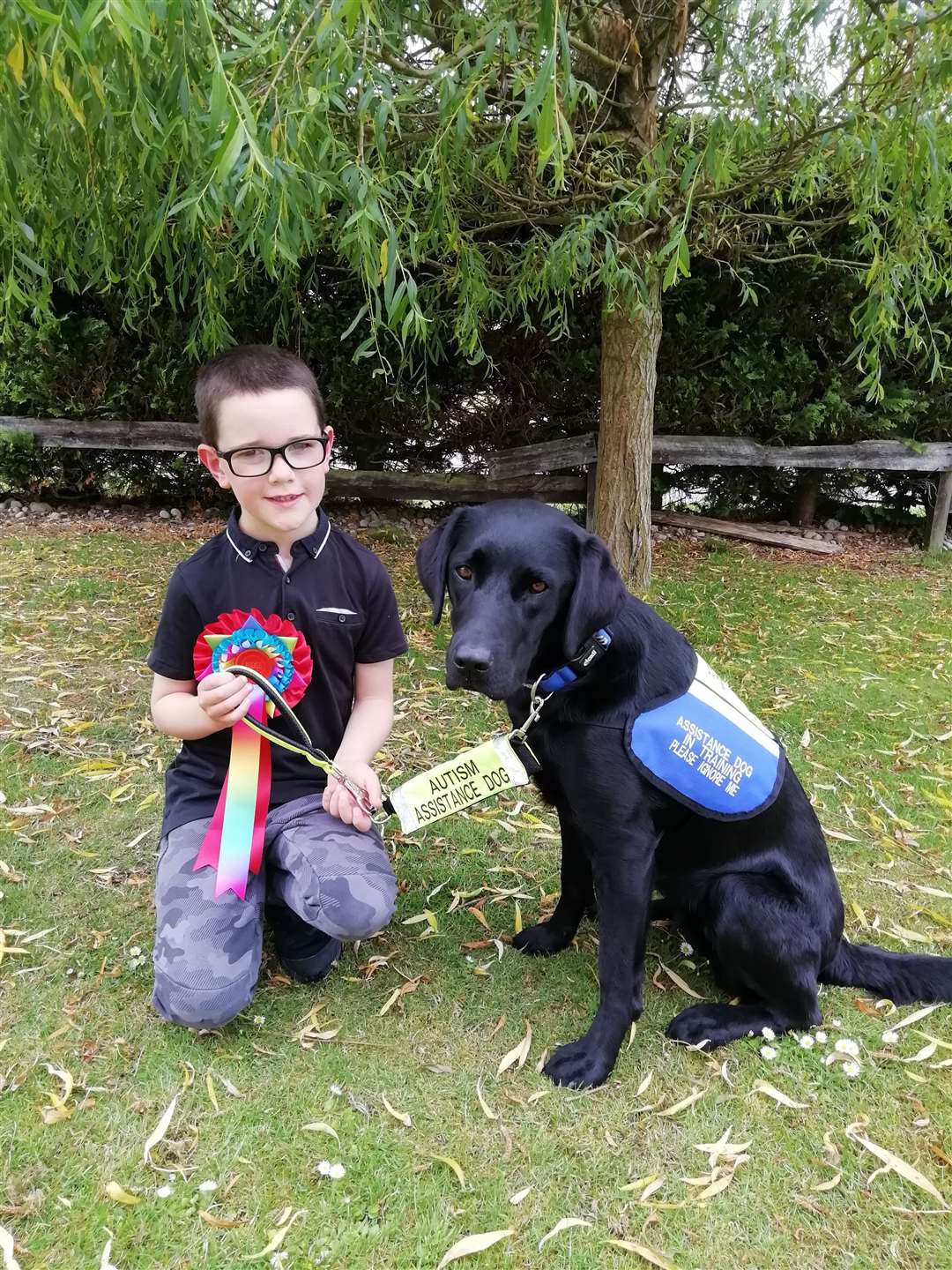 Baxter Bremner, from Spey Bay, with assistance dog Pepper, who is being specially trained through PAWtected.