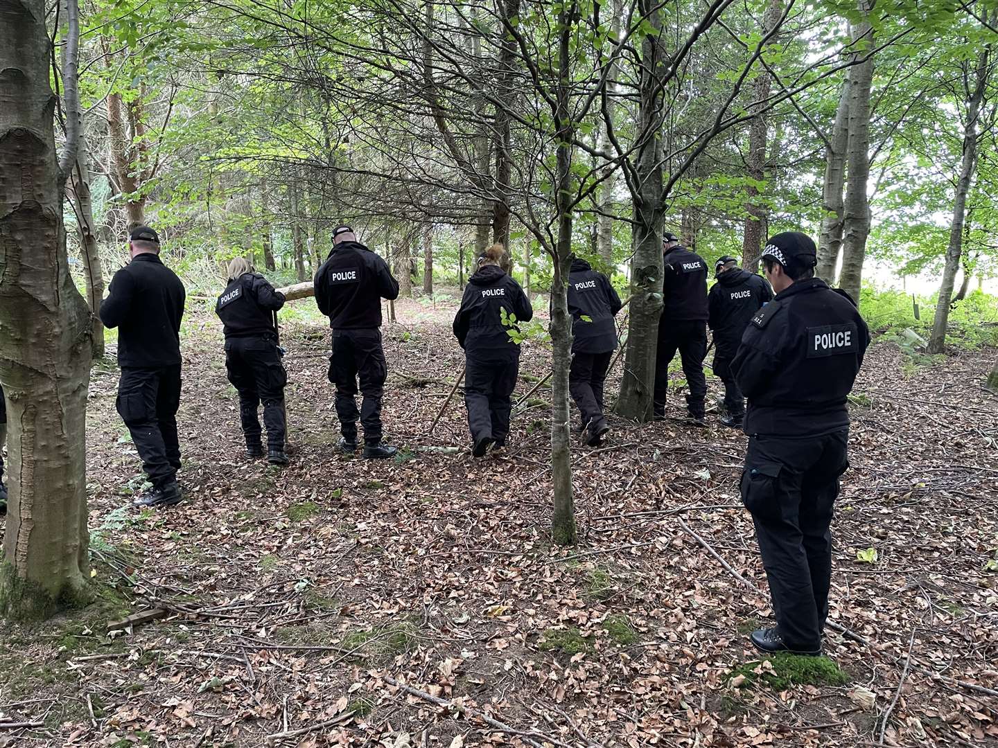 Police searching an area of woodland between Kirkwhelpington and Belsay in the north of England (Dan Barker/PA)