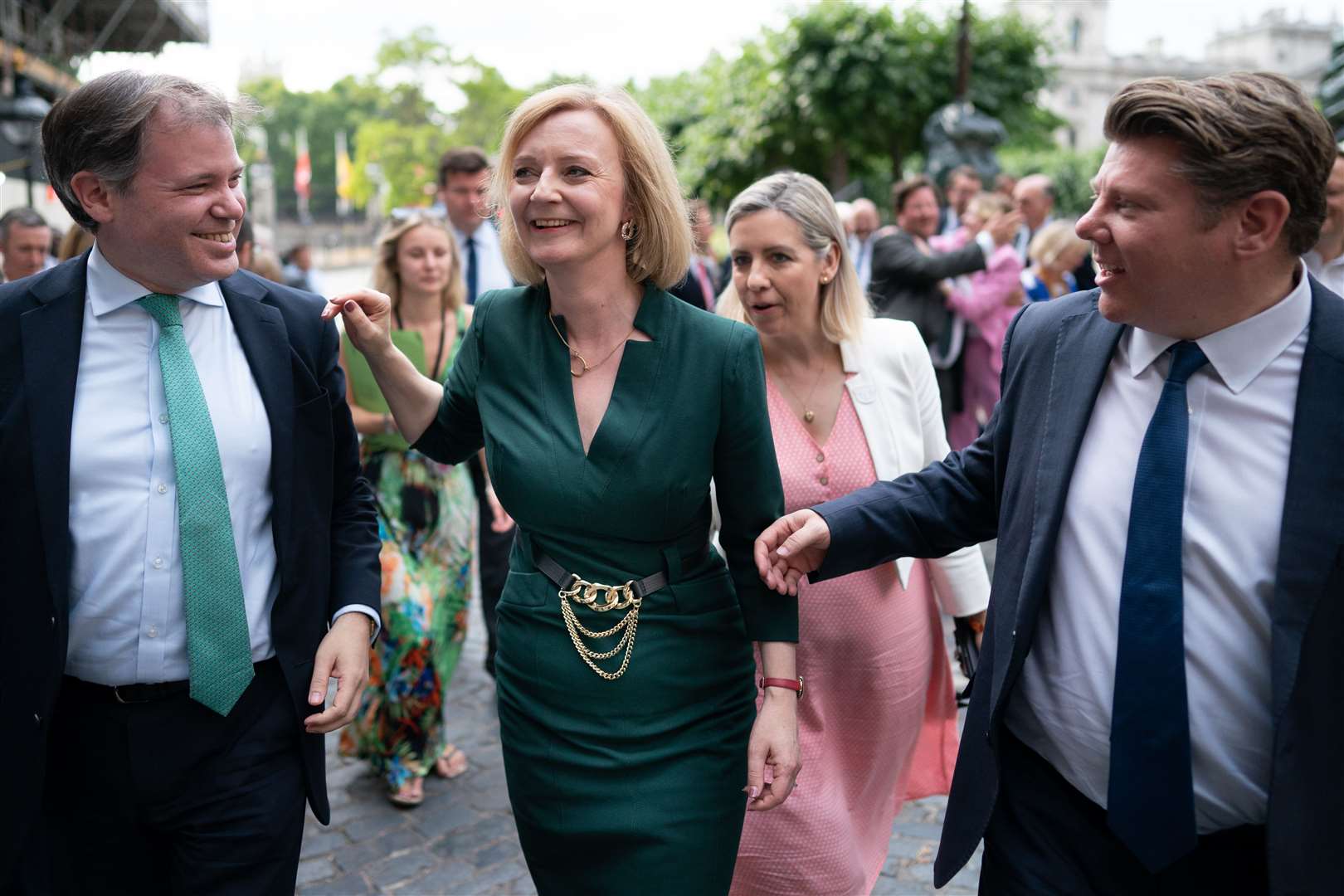 Liz Truss celebrates with her supporters after making it into the final stage of the race to Number 10 (Stefan Rousseau/PA)