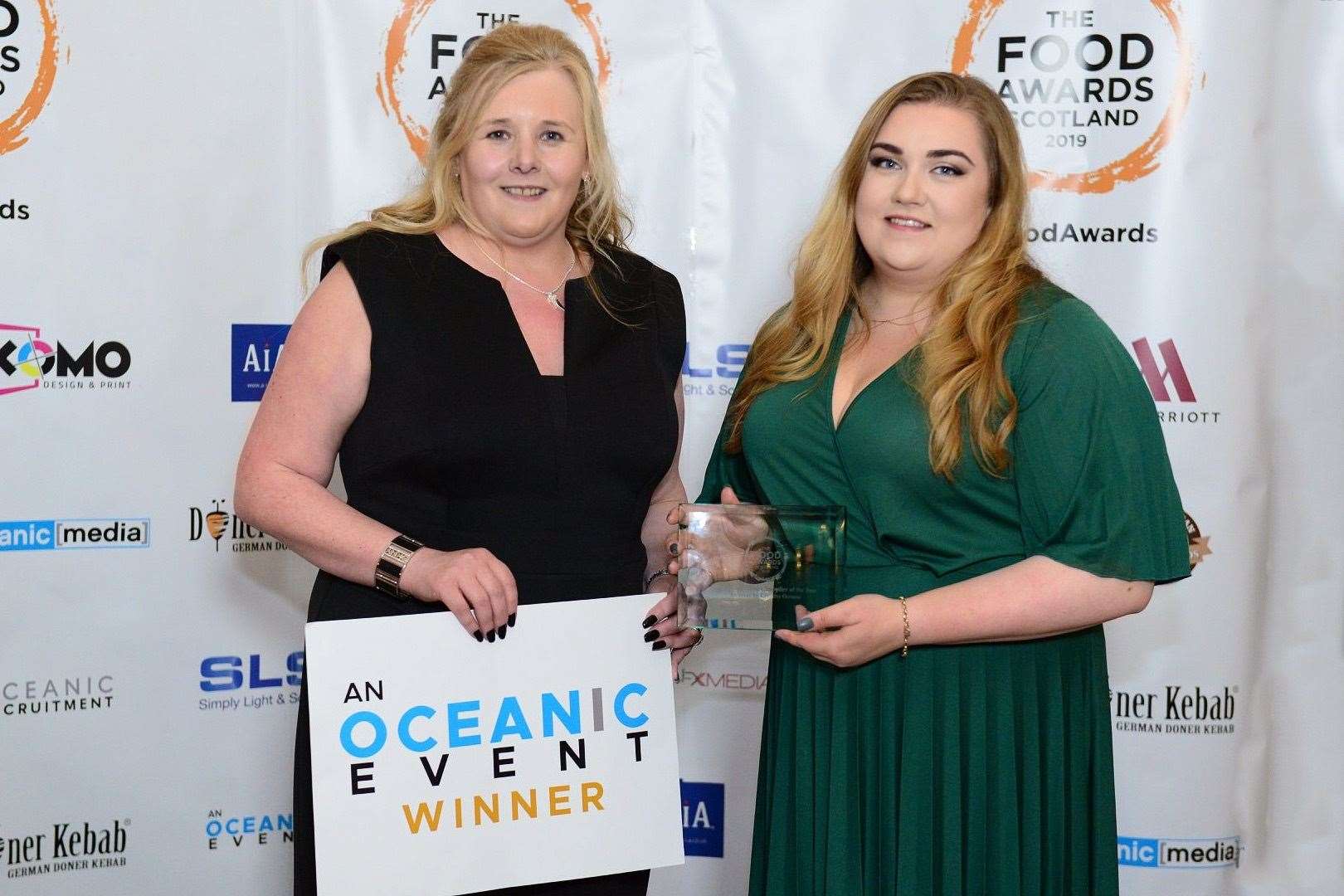 Company director Sharon Hosie and admin assistant Aenea Petrie picking up the award at the ceremony in Glasgow.
