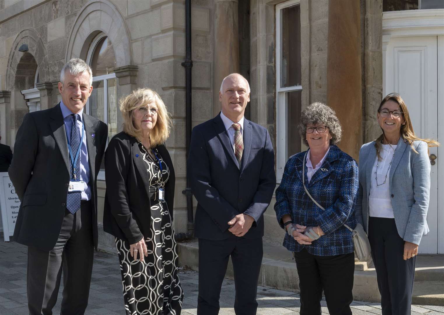 Minister Joe FitzPatrick (centre) is welcomed to Fraserburgh by Aberdeenshire Council chief executive Jim Savege, Banff and Buchan area committee chairwoman Councillor Doreen Mair, Council Leader Councillor Gillian Owen and Banff and Buchan area manager Angela Keith.