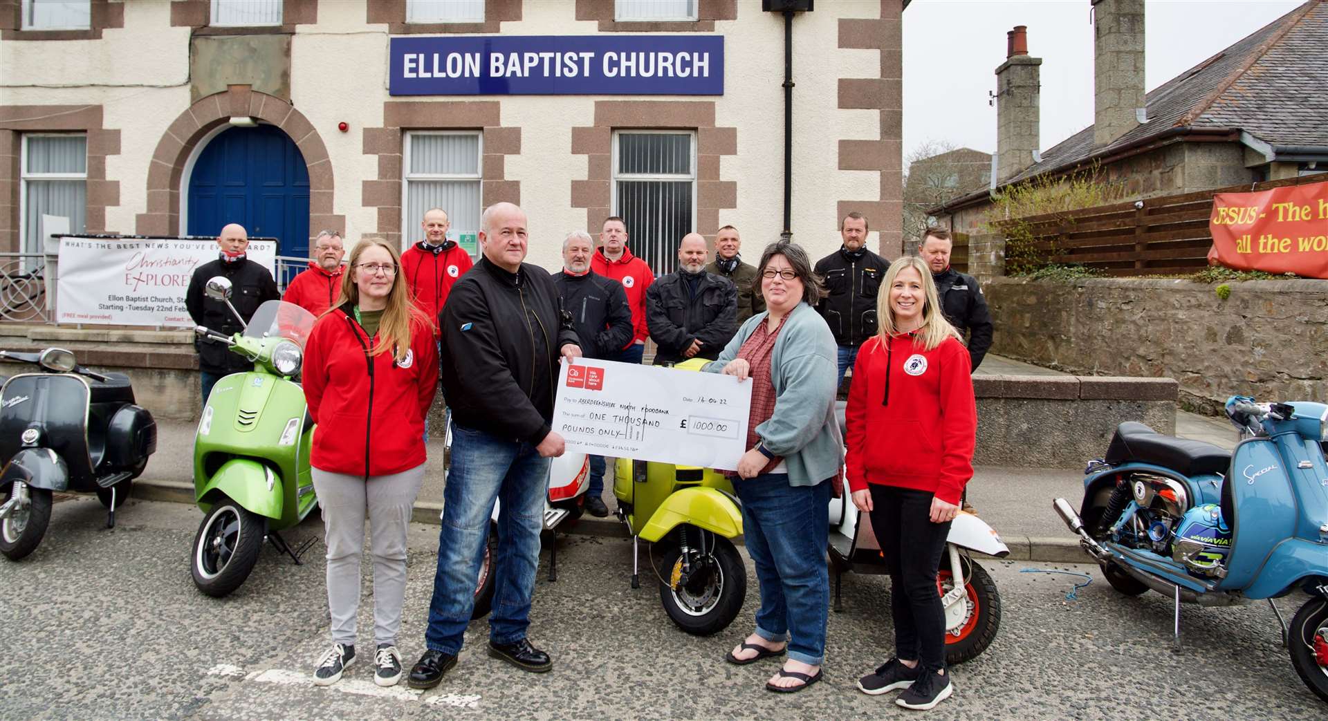 Aberdeenshire North Foodbank received a cheque for £1000 from members of the Ythan Scooter Club. Picture: Phil Harman