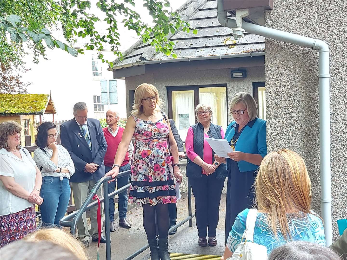 Chairwoman of the board for Networks of Wellbeing Sandra Brantingham (left), service manager Fiona Alderson (centre) and Provost Judy Whyte during the opening speeches.