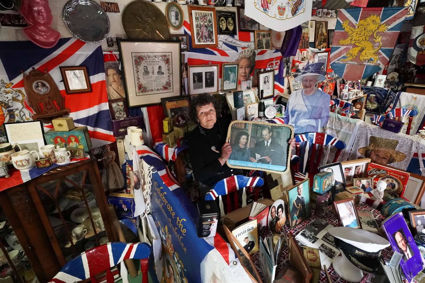 Royal expert Anita Atkinson and her collection of royal memorabilia (Owen Humphreys/PA)