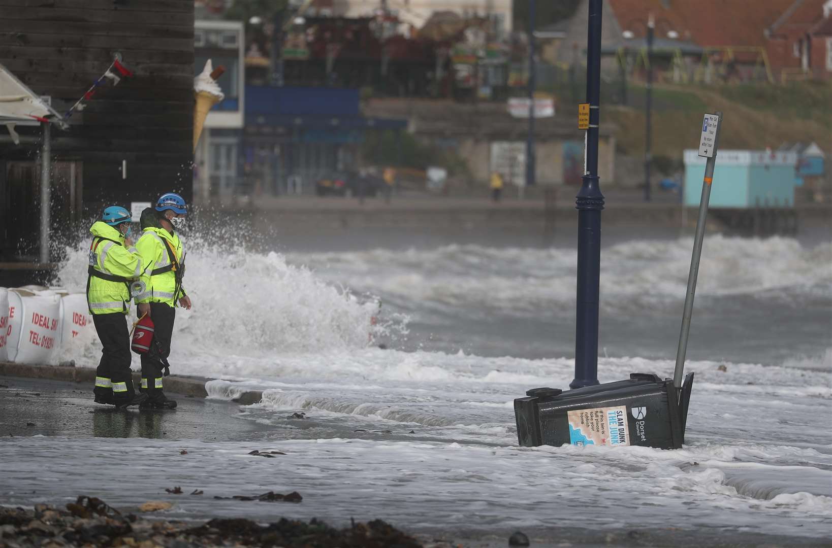 Members of the Coastguard monitor the conditions at Swanage (Steve Parsons/PA)