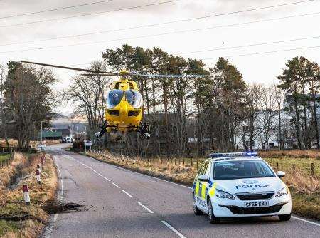 The air ambulance lands on the B9016. Photo: Brian Smith Jasper Images.