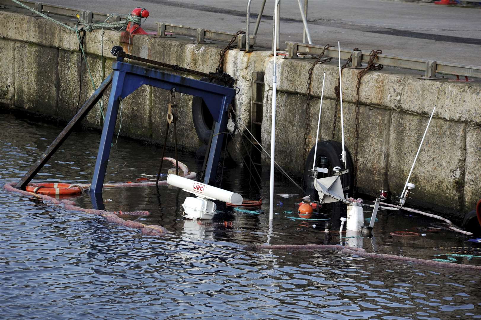 The fishing boat lies almost completely submerged at her moorings. Picture: Eric Cormack