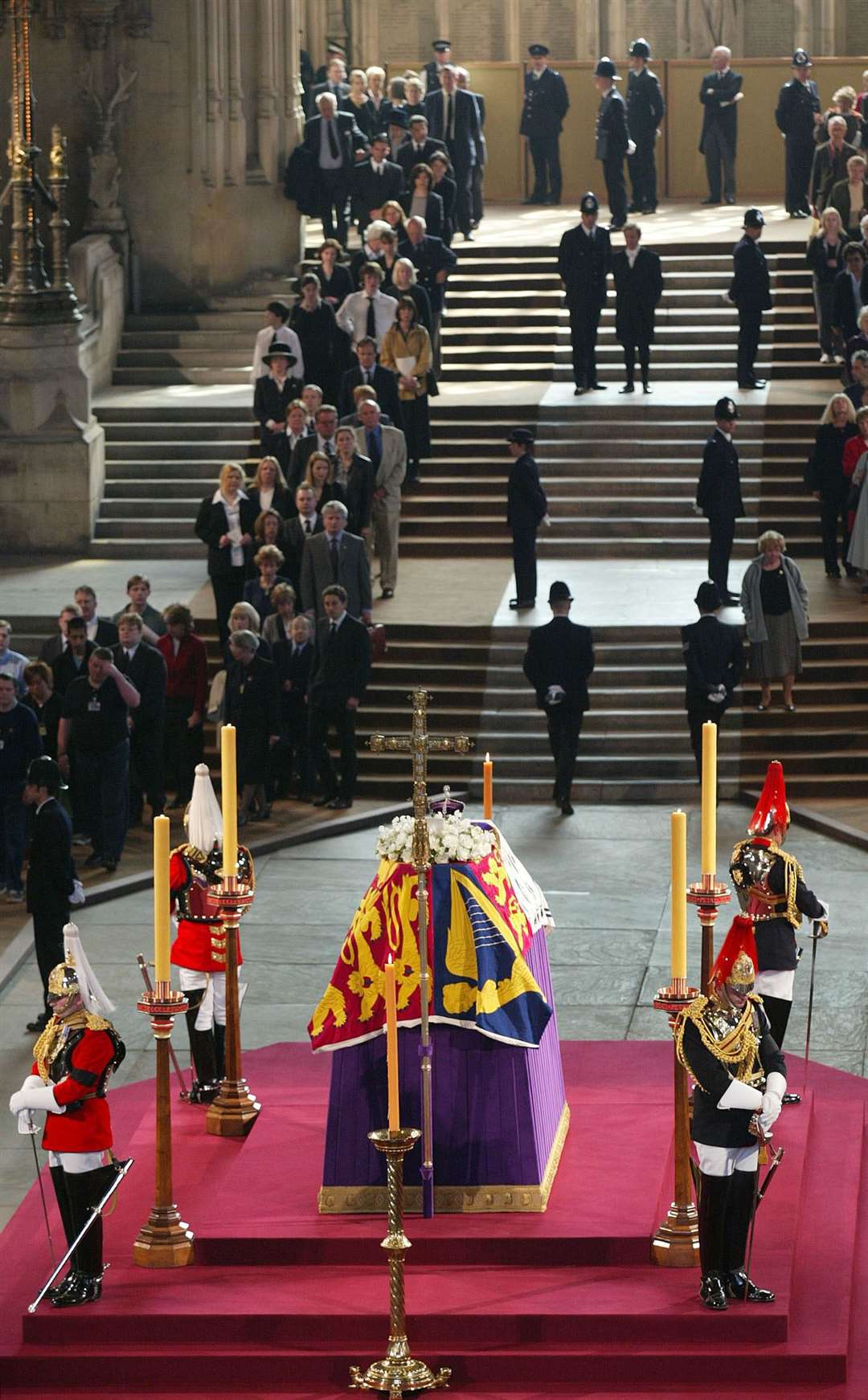 Crowds of mourners queue to file past the coffin of the Queen Mother in 2002 (Phil Noble/PA)