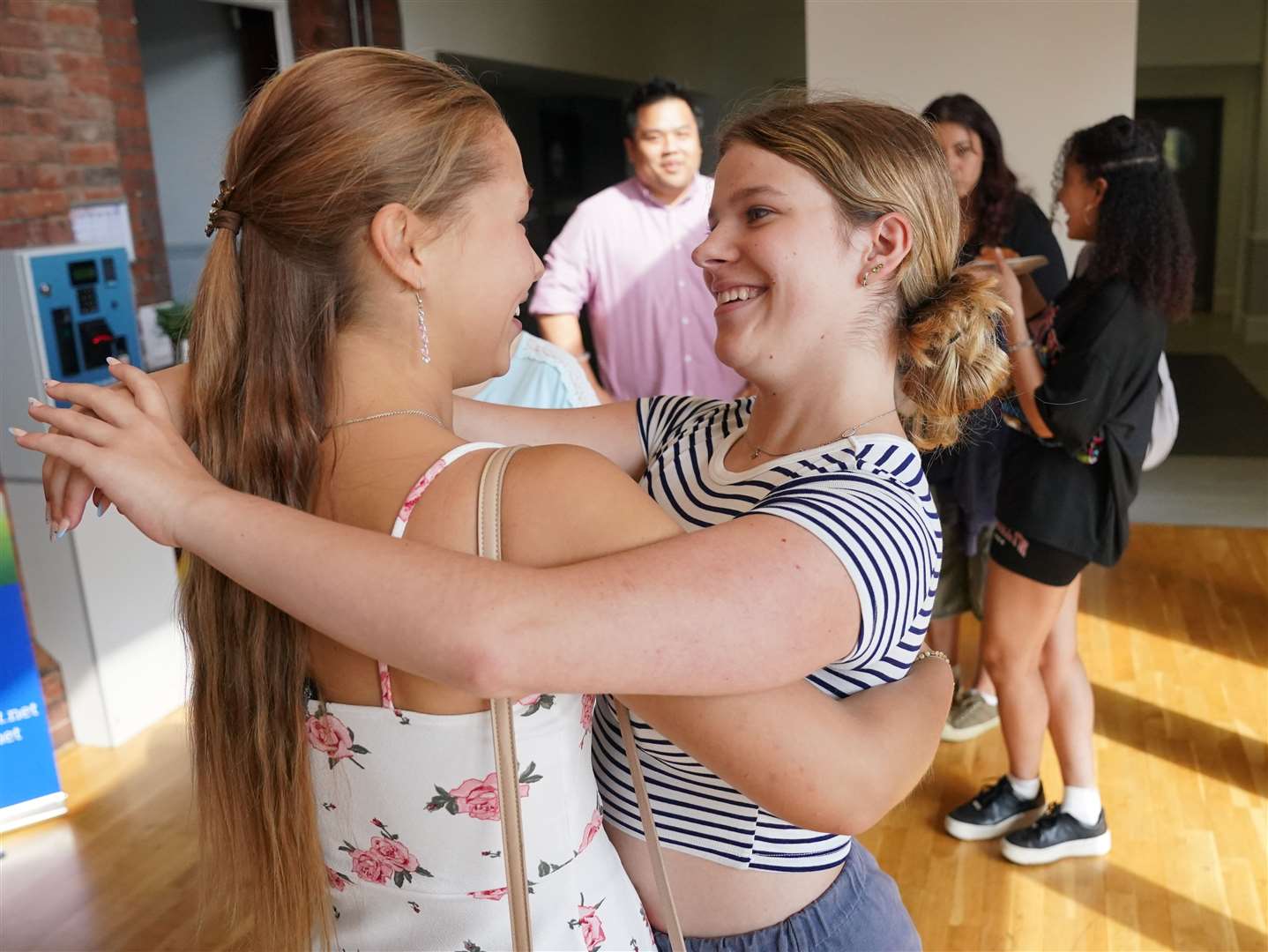 Kirsten Marks (right) and Elizaveta Filatova shared a hug at Sydenham High School in south-east London (Jonathan Brady/PA)
