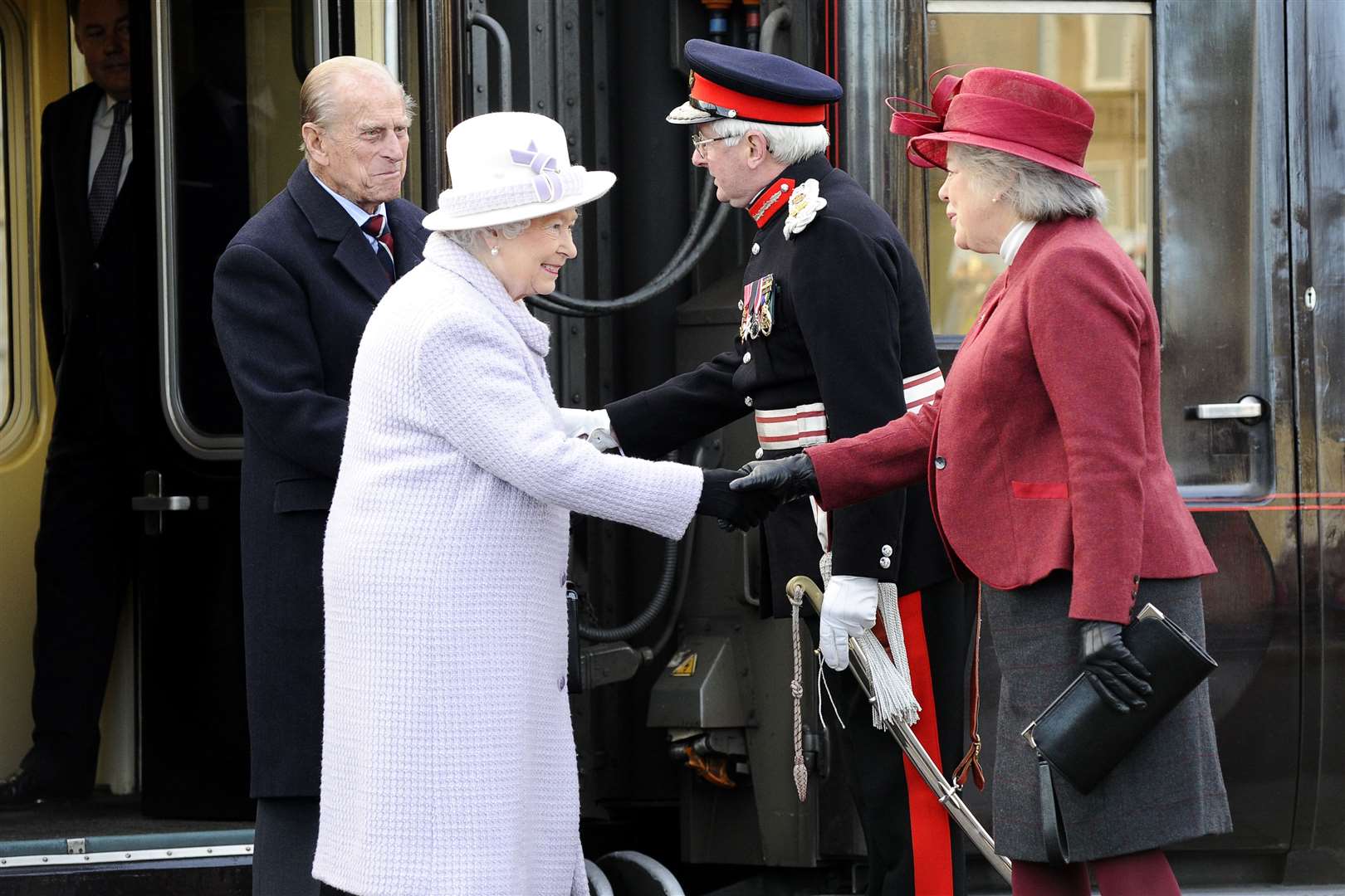 The Queen and The Duke of Edinburgh arrive at Elgin Railway Station on the Royal Train where they are greeted by then Moray Lord Lieutenant Grenville Johnston. Picture: Daniel Forsyth