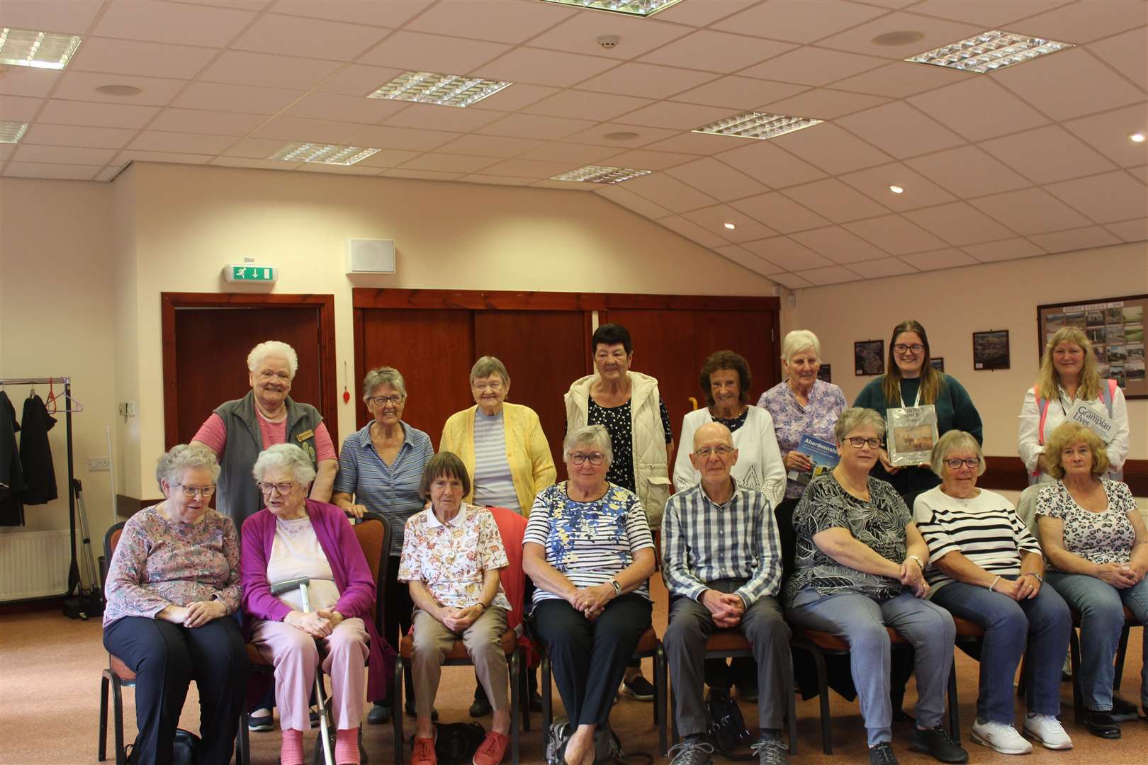 Tuesday centre members and the Reminiscence group enjoyed a presentation from Alana Low (second right standing) senior library administrator and her colleague Lorrae Riddell Charlesworth (right, standing) from Aberdeenshire library events team in the Friendship room, Kemnay village hall this week. Picture: Griselda McGregor