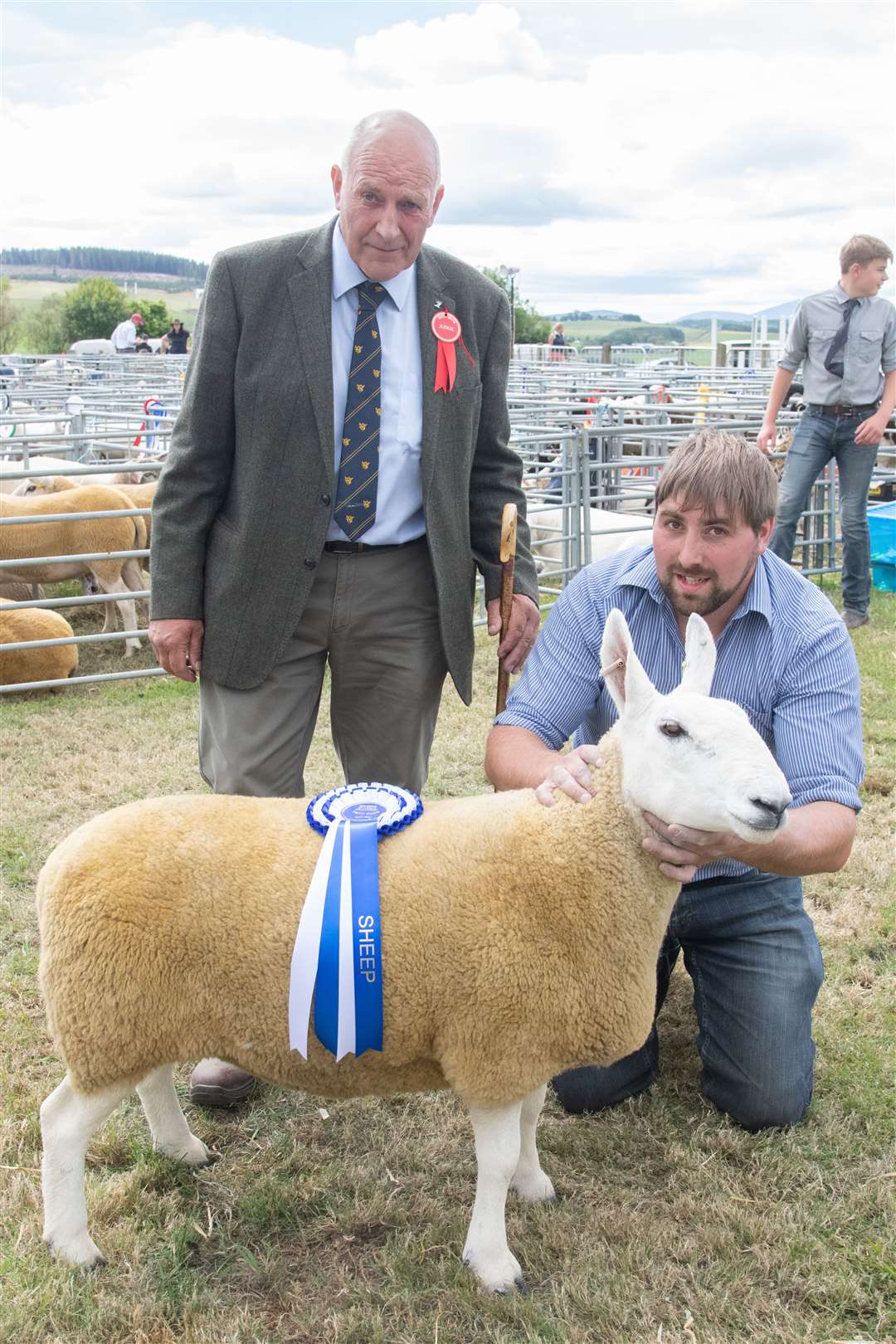 John Brown with his reserve champion Cheviot and judge Jim Hunter. Picture: Daniel Forsyth