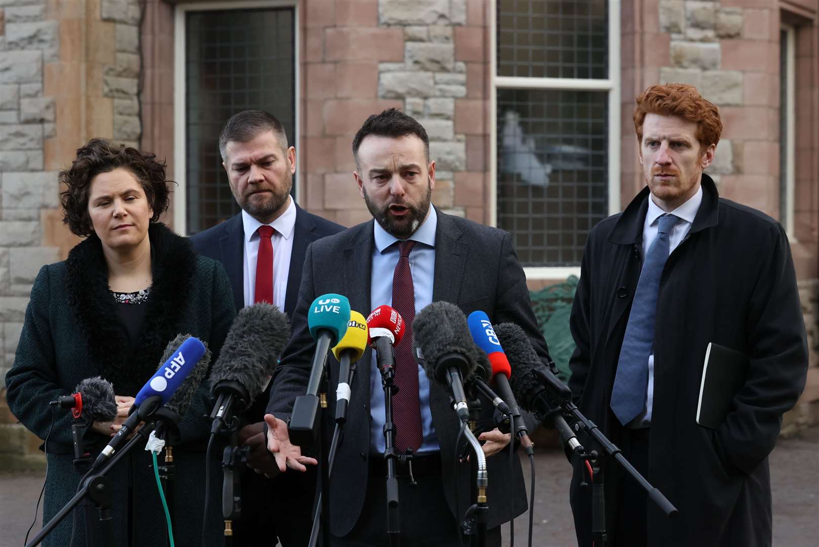 SDLP leader Colum Eastwood (centre) and party colleagues met with Rishi Sunak on Friday morning (Liam McBurney/PA)