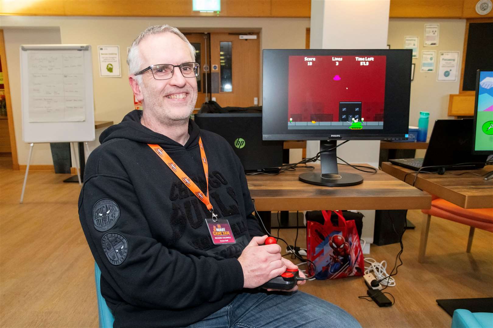 Stuart Muckley with his game Alien Abductor at the Moray Game Jam 2024 with the theme Up Up and Away held at UHI Moray, in the Beechtree Restaurant. Picture: Beth Taylor