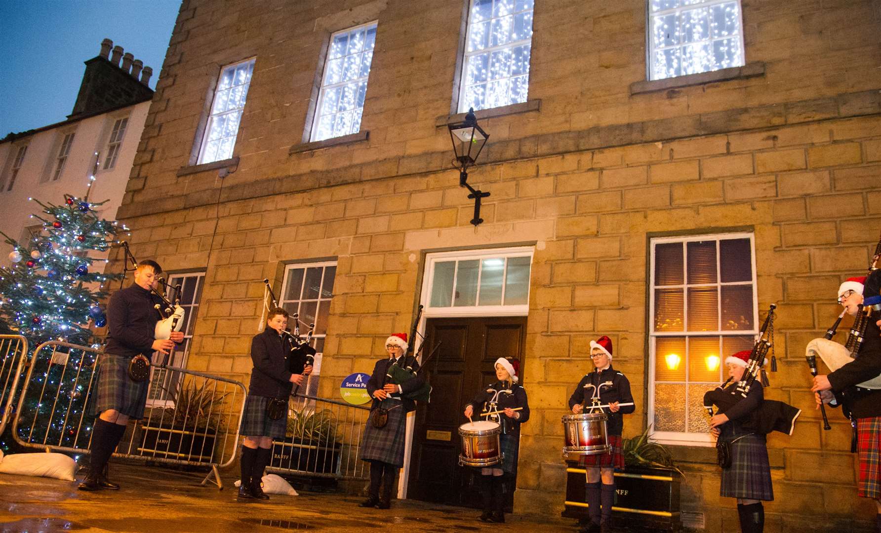 The Aberdeenshire School Pipe band played next to the Christmas tree when it was switched on. Picture: Becky Saunderson