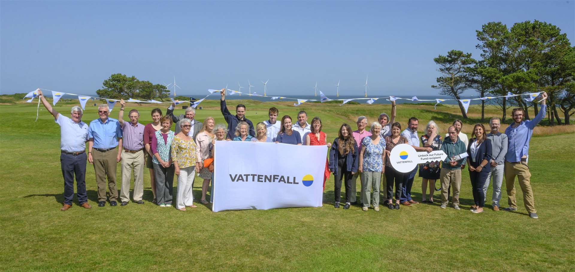 Recipients of Vattenfall's Unlock our Future Fund celebrate their awards, including Huntly and District Development Trust's Debbie Haefner (eighth from right) who is standing next to trustee Mary Scott.