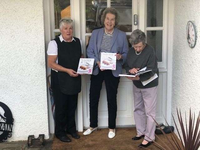 Clare Russell (centre) her cook Diana Campbell (left) and assistant Susan Durrant with the new book.