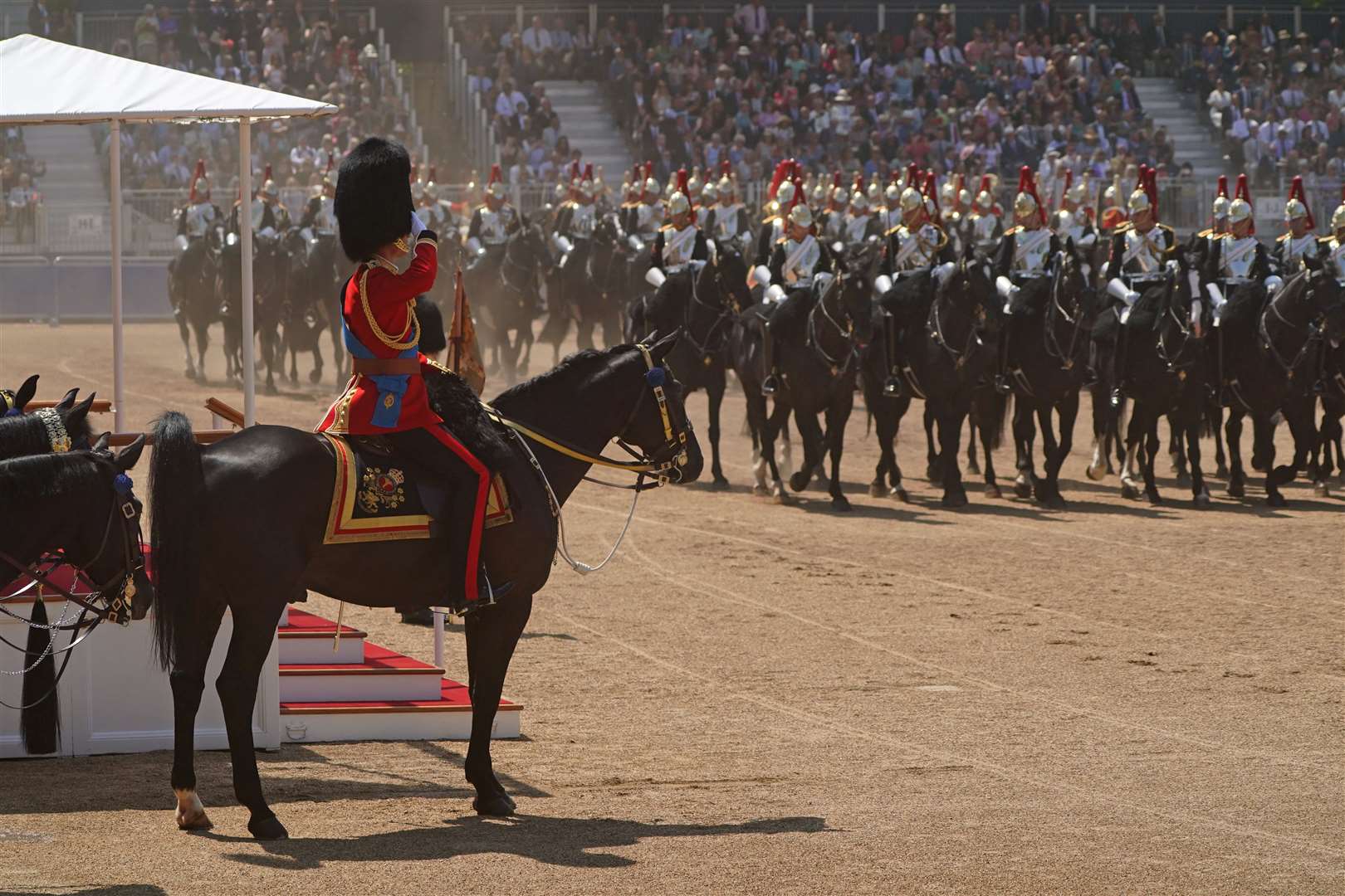 The Prince of Wales on horseback saluting during the Colonel’s Review (Jonathan Brady/PA)