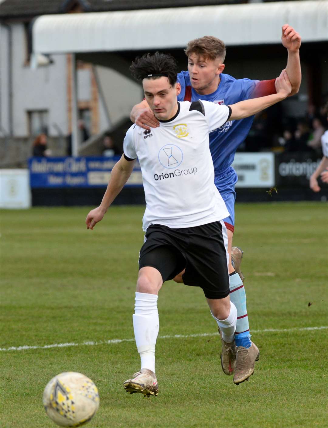 Clach's Liam Taylor battles with Keith's Keiran Mooney. Picture Gary Anthony.