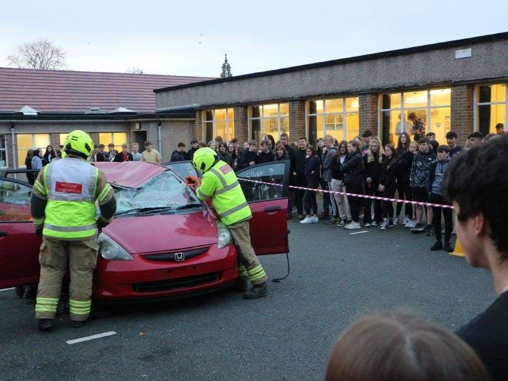 Firefighters demonstrate crash procedures at The Gordon Schools.