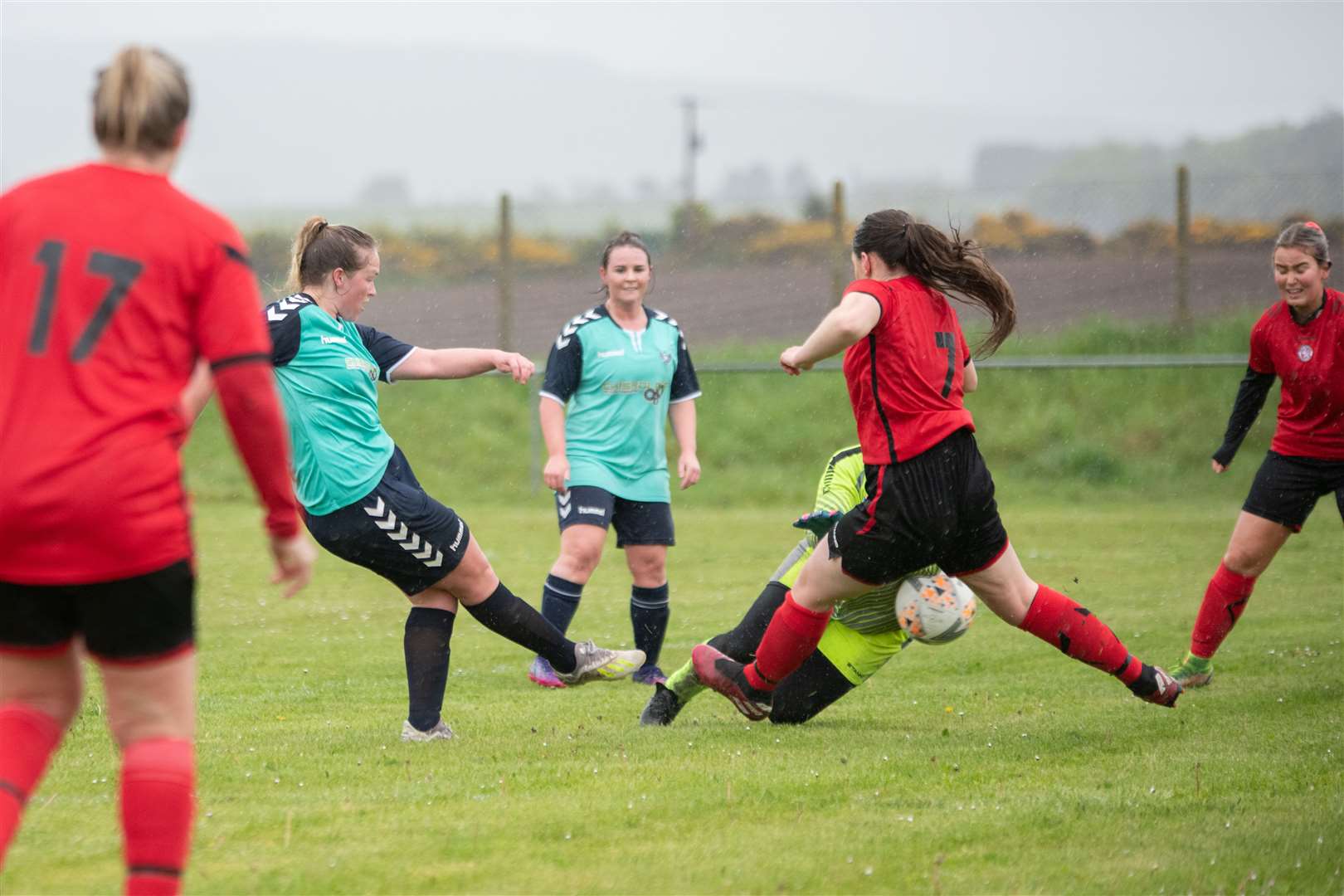 Buckie Ladies' Emily McAuslan (left) opens the scoring for the home side. ..Buckie Ladies FC (8) vs Brora Rangers Ladies FC (1) - SWF Highlands and Islands League - Gordon Park, Portgordon 14/05/2023...Picture: Daniel Forsyth..