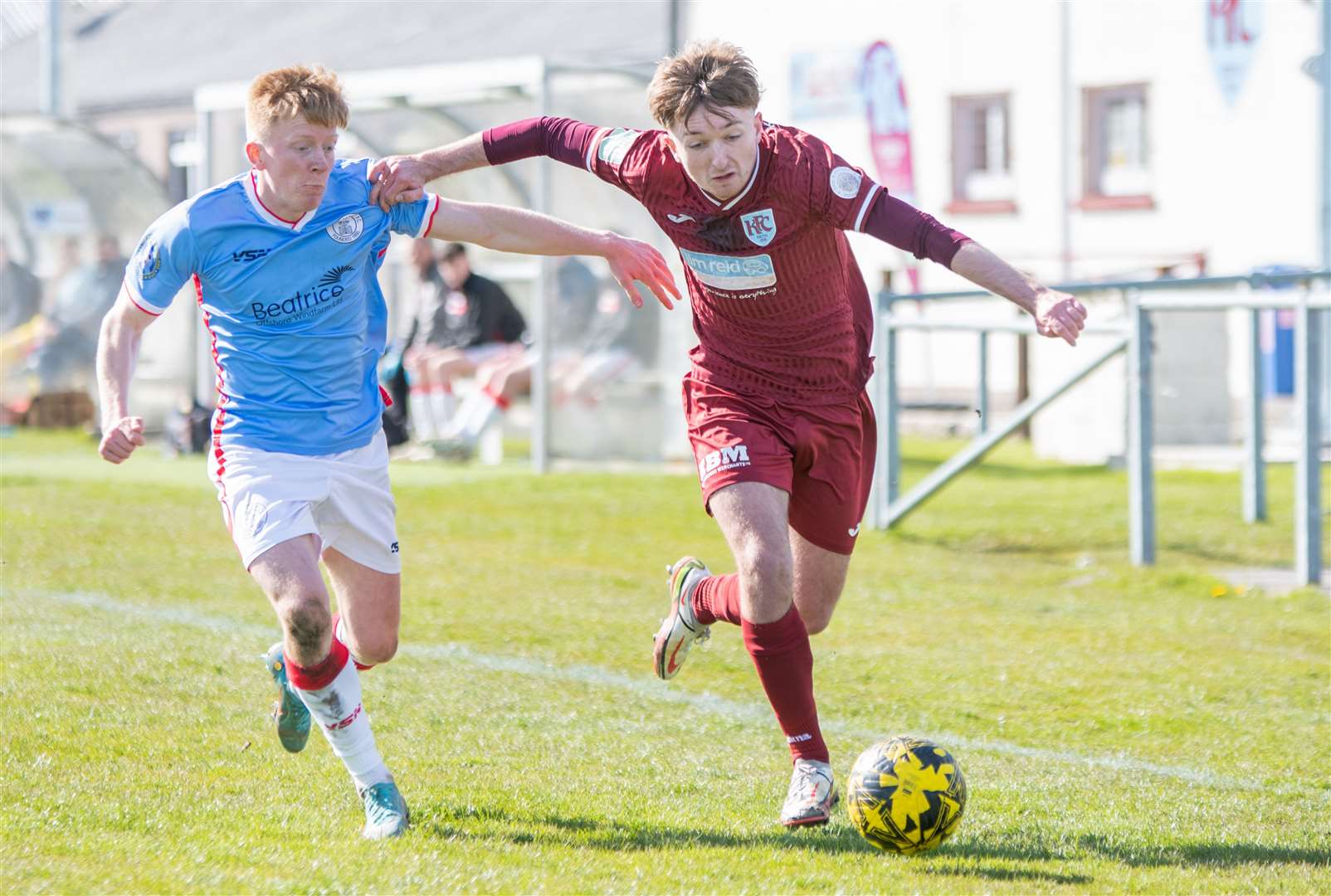 Keith's Jordan Lynch holds off a challenging Ross Gunn as the Maroon plays up the wing.Picture: Daniel Forsyth.