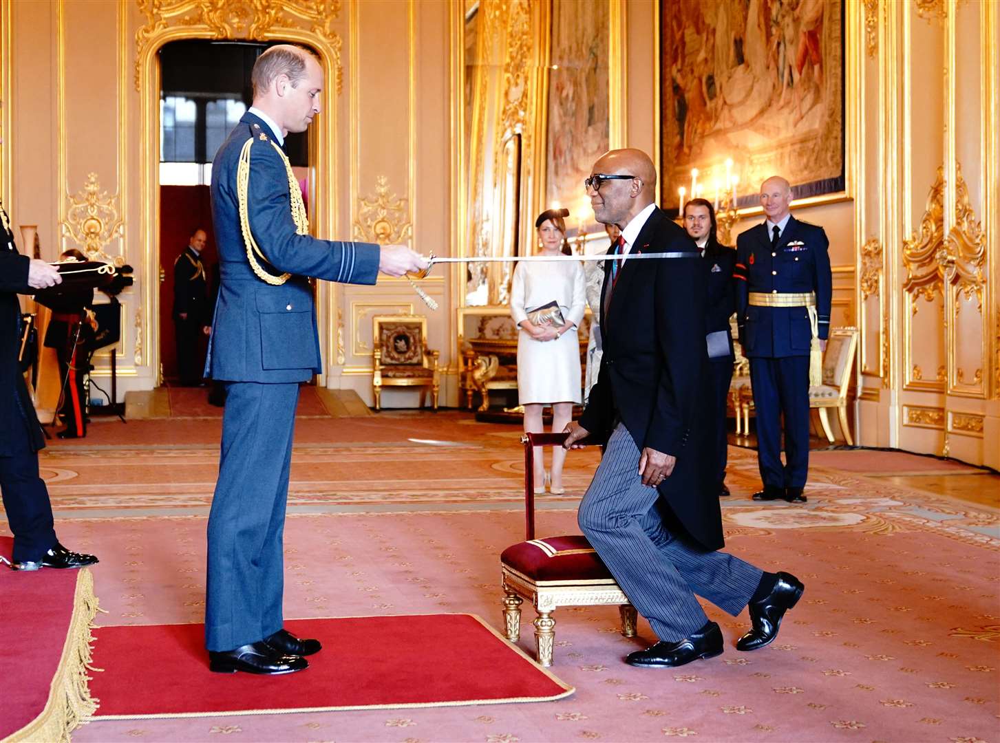 Sir Trevor Phillips is made a Knight Bachelor by the Prince of Wales (Yui Mok/PA)