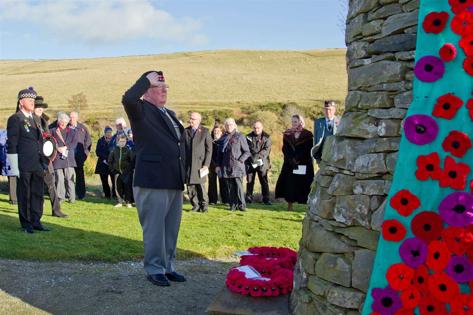 The Cabrach Community come together to mark the WW1 Centenary on Saturday the 10th of November...Bill Gordon salutes the memorial after laying a wreath on behalf of the Gordon Highlanders...Picture: Daniel Forsyth. Image No.042559.