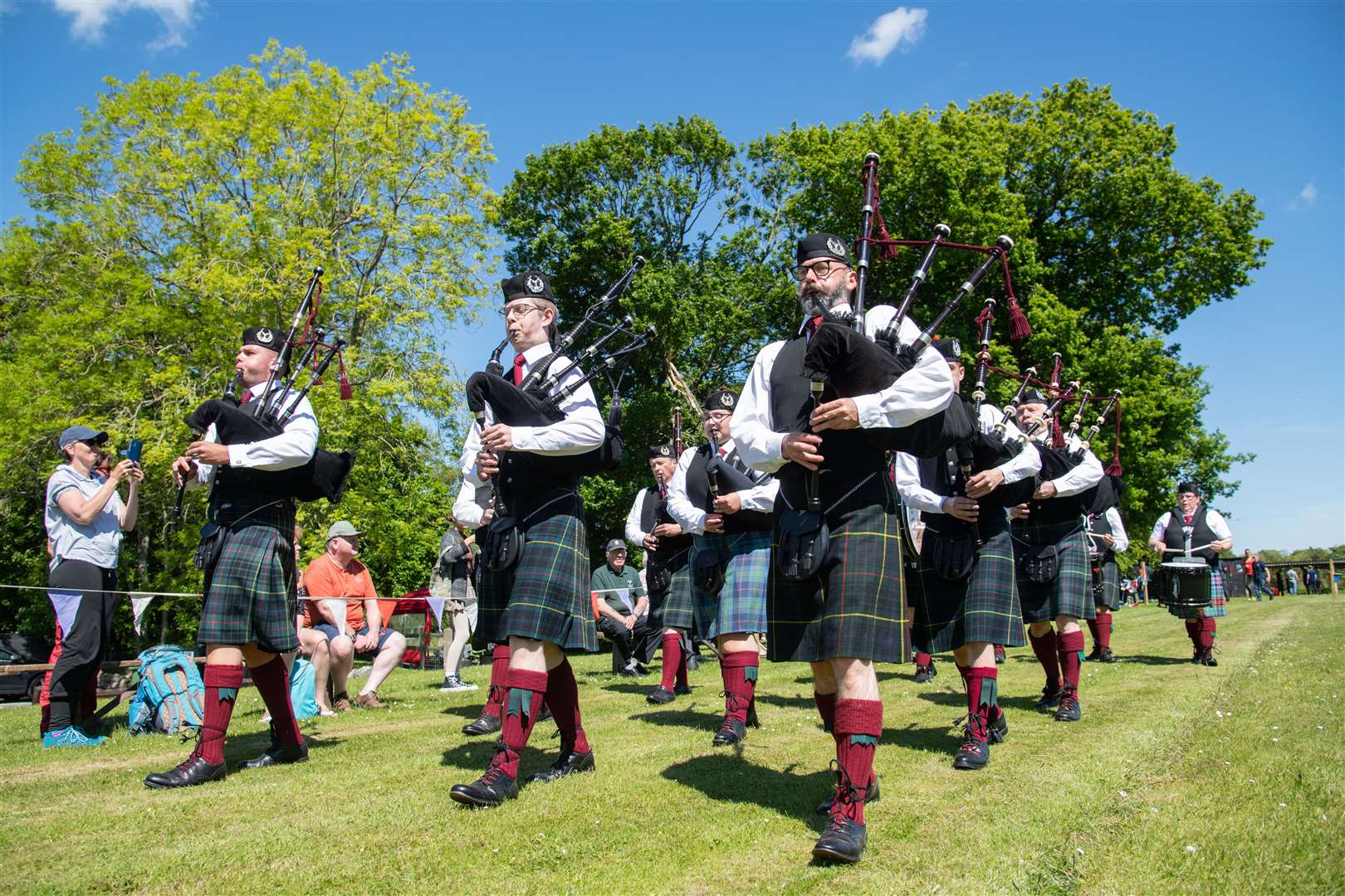 The Portsoy Pipe Band make their way around the games field...Cornhill Highland Games - Saturday 4th June 2022...Picture: Daniel Forsyth..