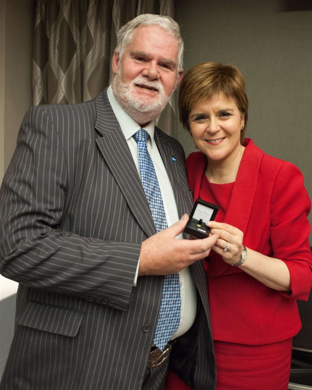 Stuart Pratt with First Minister Nicola Sturgeon at an event in 2017 to mark his service as a local councillor.