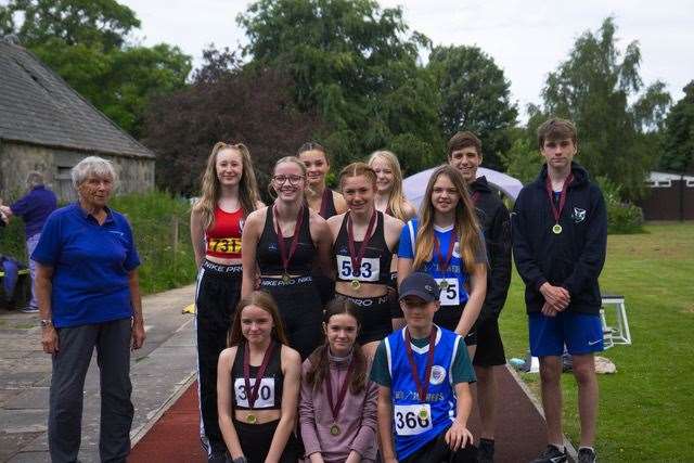 Coach Margery Swinton with the secondary school competitors. Photo: Kyle Wilkinson