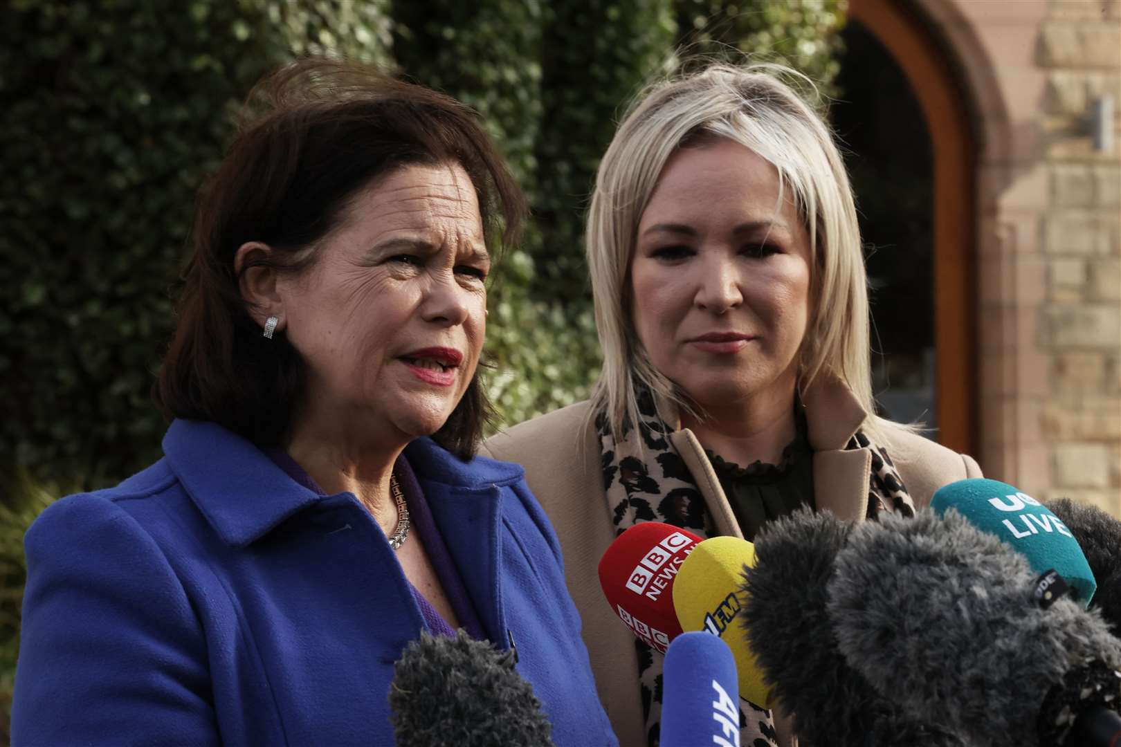 Sinn Fein Party leader Mary Lou McDonald (left) and vice president Michelle O’Neill speak to the media outside the Culloden Hotel in Belfast. (PA)