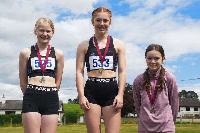 Gemma Forgie, Holly Whittaker and Sylvie Slater at the Knockando schools jumps competition. Photo: Kyle Wilkinson