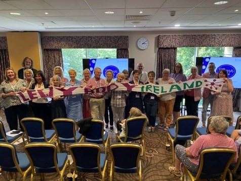 The Lewy Body Ireland scarf pictured with the delegates at an international conference in Newcastle last month (Joe Kane/PA)